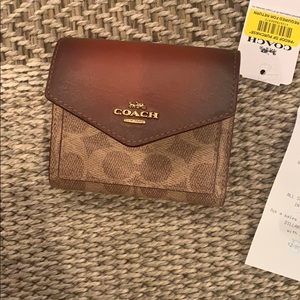Coach tan/rust wallet